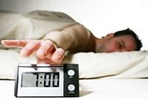hitting the snooze button on alarm at 7am