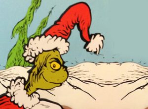 the grinch looking at snow