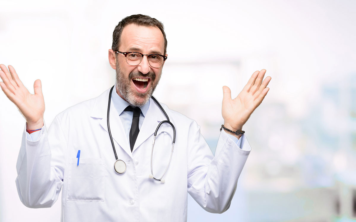 Happy practice owner because he sold his medical practice.