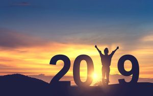 Person standing between the 20 and 9 of 2019. Best medical website designs.